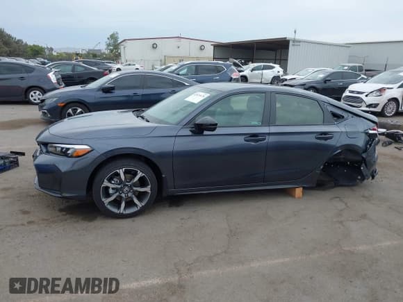 ✅ 2025 Honda Civic Sport Touring • VIN: JHMFL4H91SX003848 • Lot: 43075678. Listed on IAAI with 1,885 mi. Free auction sales archive from the USA and detailed vehicle history report at DreamBid. Image 15.