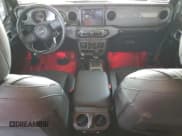 ✅ 2022 Jeep Wrangler Unlimited High Tide • VIN: 1C4HJXDG2NW221829 • Lot: 64836074. Listed on Copart with 3,394 mi. Free auction sales archive from the USA and detailed vehicle history report at DreamBid. Image 8.