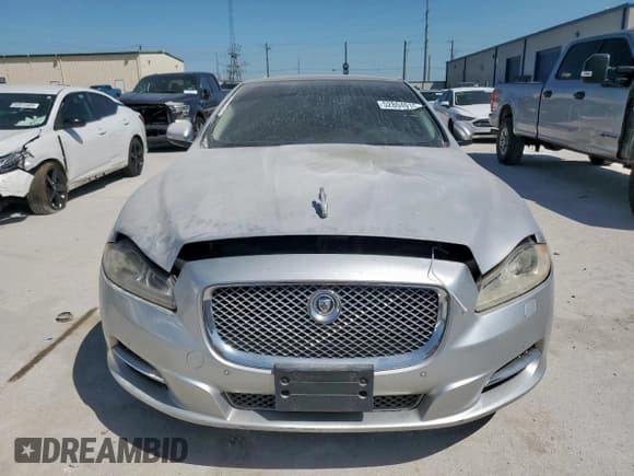 ✅ 2012 Jaguar XJ • VIN: SAJWA1CB0CLV23002 • Lot: 52804915. Wystawiony na Copart z przebiegiem 149 331 mil. Bezpłatny archiwum sprzedaży aukcyjnych z USA i szczegółowy raport historii pojazdu na DreamBid. Zdjęcie 5.