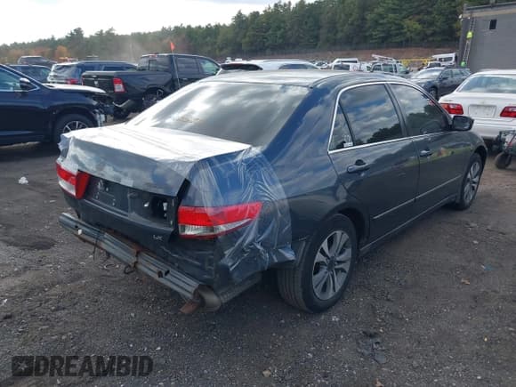 ✅ 2003 Honda Accord LX • VIN: 1HGCM56313A009970 • Лот: 43370285. Опубликован ранее на IAAI с пробегом 248 497 миль. Бесплатный доступ к архиву аукционных продаж из США и подробный отчёт об истории автомобиля на DreamBid. Изображение 4.