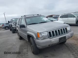 ✅ 1998 Jeep Grand Cherokee Laredo • VIN: 1J4FX58S6WC354101 • Lot: 42158671. Listed on IAAI with 289,318 mi. Free auction sales archive from the USA and detailed vehicle history report at DreamBid. Image 1.