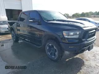 ✅ 2019 Ram 1500 Rebel • VIN: 1C6SRFLTXKN812507 • Lot: 42592453. Listed on IAAI with 128,714 mi. Free auction sales archive from the USA and detailed vehicle history report at DreamBid. Image 1.