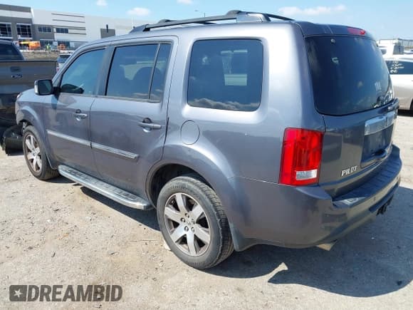 ✅ 2015 Honda Pilot Touring • VIN: 5FNYF3H95FB014847 • Lot: 43123084. Listed on IAAI with 150,425 mi. Free auction sales archive from the USA and detailed vehicle history report at DreamBid. Image 3.