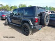 ✅ 2023 Jeep Wrangler Sahara • VIN: 1C4JJXP69PW684803 • Lot: 42214320. Listed on IAAI with 37,723 mi. Free auction sales archive from the USA and detailed vehicle history report at DreamBid. Image 3.