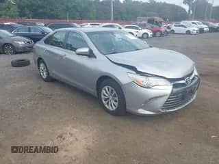 2015 Toyota Camry LE with VIN 4T4BF1FK2FR453576, listed as a IAAI auction lot 43327984 with 129,041 mi miles and . Bid and sale history available at DreamBid. Image 1.