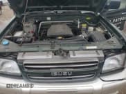 ✅ 2002 Isuzu Trooper S • VIN: JACDJ58X127J10500 • Lot: 85403245. Listed on Copart with 216,762 mi. Free auction sales archive from the USA and detailed vehicle history report at DreamBid. Image 12.