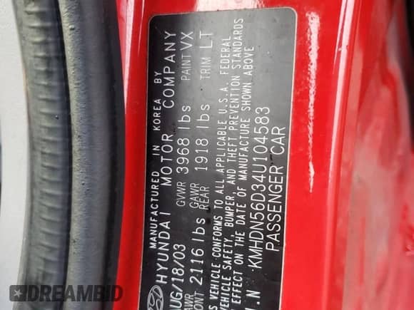 2004 Hyundai Elantra GT z VIN KMHDN56D34U104583, wystawiony jako Copart lot #82441094 z przebiegiem Nie podano mil oraz Szkoda całkowita • Salvage title. Historia ofert i sprzedaży dostępna na DreamBid. Obrazek 12.