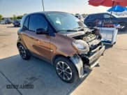 ✅ 2016 Smart fortwo Passion • VIN: WMEFJ5DA3GK048048 • Lot: 71927625. Wystawiony na Copart z przebiegiem 35 077 mil. Bezpłatny archiwum sprzedaży aukcyjnych z USA i szczegółowy raport historii pojazdu na DreamBid. Zdjęcie 4.
