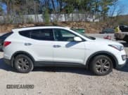 ✅ 2014 Hyundai Santa Fe • VIN: 5XYZUDLB4EG175627 • Lot: 43428688. Listed on IAAI with 150,000 mi. Free auction sales archive from the USA and detailed vehicle history report at DreamBid. Image 13.