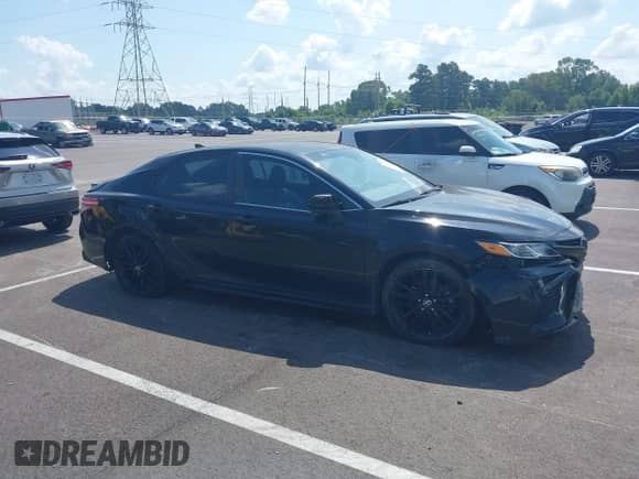 2019 Toyota Camry LE with VIN 4T1B11HK8KU256007, listed as a IAAI auction lot 42930126 with 107,264 mi miles and . Bid and sale history available at DreamBid. Image 12.