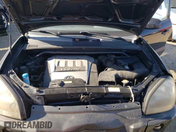 2005 Hyundai Tucson GLS z VIN KM8JN12D45U065618, wystawiony jako Copart lot #77370754 z przebiegiem 87 525 mil mil oraz Szkoda całkowita • Salvage title. Historia ofert i sprzedaży dostępna na DreamBid. Obrazek 12.