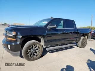 ✅ 2018 Chevrolet Silverado 1500 LT • VIN: 3GCUKREC5JG164974 • Лот: 90520345. Опубликован ранее на Copart с пробегом 171 279 миль. Бесплатный доступ к архиву аукционных продаж из США и подробный отчёт об истории автомобиля на DreamBid. Изображение 1.