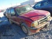 ✅ 1997 Chevrolet Blazer LS • VIN: 1GNDT13W3V2232285 • Lot: 41710231. Wystawiony na IAAI z przebiegiem 1 930 079 mil. Bezpłatny archiwum sprzedaży aukcyjnych z USA i szczegółowy raport historii pojazdu na DreamBid. Zdjęcie 1.
