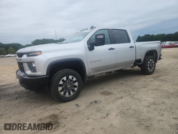 ✅ 2023 Chevrolet Silverado 2500HD Custom • VIN: 2GC4YMEY1P1727467 • Лот: 70299495. Опубликован ранее на Copart с пробегом 242 482 миль. Бесплатный доступ к архиву аукционных продаж из США и подробный отчёт об истории автомобиля на DreamBid. Изображение 1.