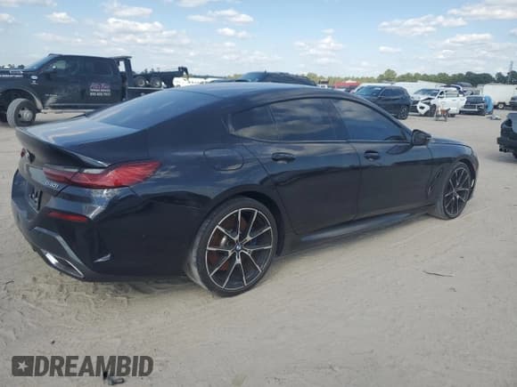 ✅ 2022 BMW 8 Series 840i • VIN: WBAGV2C07NCH63534 • Лот: 74443014. Опубликован ранее на Copart с пробегом 12 838 миль. Бесплатный доступ к архиву аукционных продаж из США и подробный отчёт об истории автомобиля на DreamBid. Изображение 3.