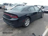 ✅ 2023 Dodge Charger SXT • VIN: 2C3CDXBG5PH579520 • Lot: 43245472. Listed on IAAI with 59,873 mi. Free auction sales archive from the USA and detailed vehicle history report at DreamBid. Image 4.