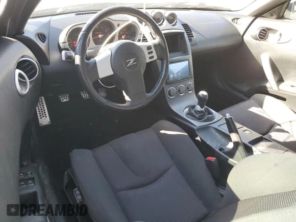 ✅ 2003 Nissan 350Z Touring • VIN: JN1AZ34D13T104186 • Лот: 91403345. Опубликован ранее на Copart с пробегом 51 403 миль. Бесплатный доступ к архиву аукционных продаж из США и подробный отчёт об истории автомобиля на DreamBid. Изображение 8.