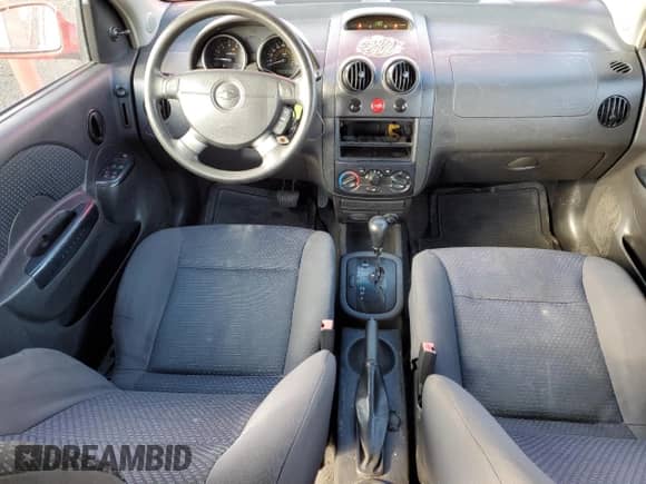 2006 Chevrolet Aveo z VIN KL1TG69666B572018, wystawiony jako Copart lot #78150204 z przebiegiem 267 611 mil mil oraz Czysty tytuł • Clean title. Historia ofert i sprzedaży dostępna na DreamBid. Obrazek 8.