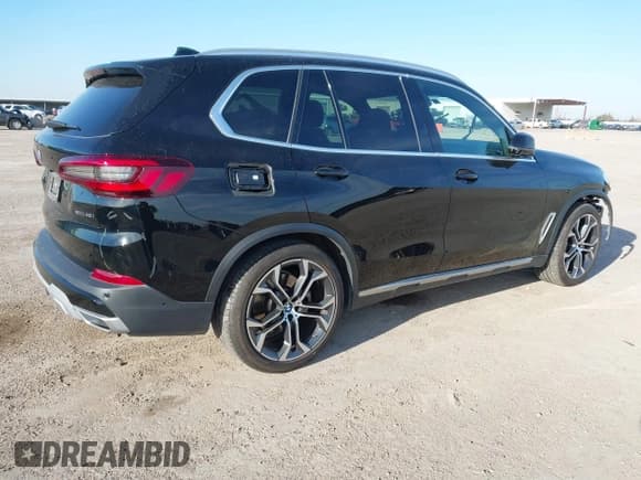 ✅ 2021 BMW X5 sDrive40i • VIN: 5UXCR4C03M9F14207 • Lot: 41286501. Listed on IAAI with 41,679 mi. Free auction sales archive from the USA and detailed vehicle history report at DreamBid. Image 4.