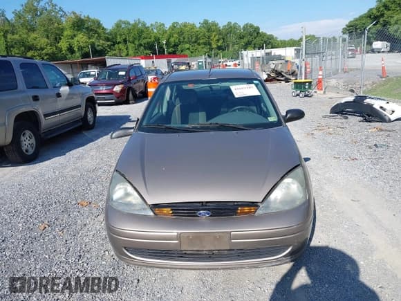 ✅ 2003 Ford Focus LX • VIN: 1FAFP33P63W324786 • Lot: 42693187. Wystawiony na IAAI z przebiegiem 128 597 mil. Bezpłatny archiwum sprzedaży aukcyjnych z USA i szczegółowy raport historii pojazdu na DreamBid. Zdjęcie 13.