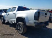 ✅ 2018 Chevrolet Colorado 4WD ZR2 • VIN: 1GCGTEEN9J1285719 • Лот: 42983123. Опубликован ранее на IAAI с пробегом 157 118 миль. Бесплатный доступ к архиву аукционных продаж из США и подробный отчёт об истории автомобиля на DreamBid. Изображение 3.