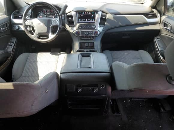 2018 Chevrolet Suburban LS с VIN 1GNSCGKC1JR194249, выставлен на аукционе Copart как лот 61763195 с пробегом 91 517 миль миль и Списание • Salvage title. История ставок и продаж доступна на DreamBid. Изображение 8.