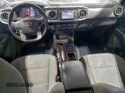 ✅ 2018 Toyota Tacoma TRD Off Road • VIN: 3TMDZ5BN2JM047753 • Lot: 93387185. Listed on Copart with 186,568 mi. Free auction sales archive from the USA and detailed vehicle history report at DreamBid. Image 8.