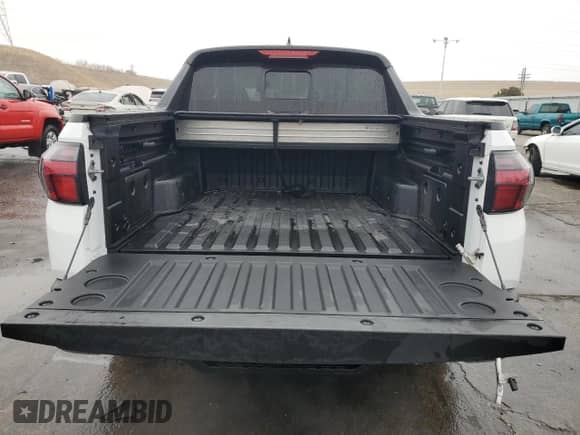 2024 Hyundai Santa Cruz SEL с VIN 5NTJCDAE6RH077471, выставлен на аукционе Copart как лот 45231415 с пробегом 18 386 миль миль и Списание • Salvage title. История ставок и продаж доступна на DreamBid. Изображение 6.