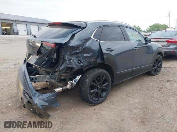 ✅ 2023 Mazda CX-30 S Carbon Edition • VIN: 3MVDMBCM4PM577619 • Lot: 42219801. Listed on IAAI with 24,784 mi. Free auction sales archive from the USA and detailed vehicle history report at DreamBid. Image 4.