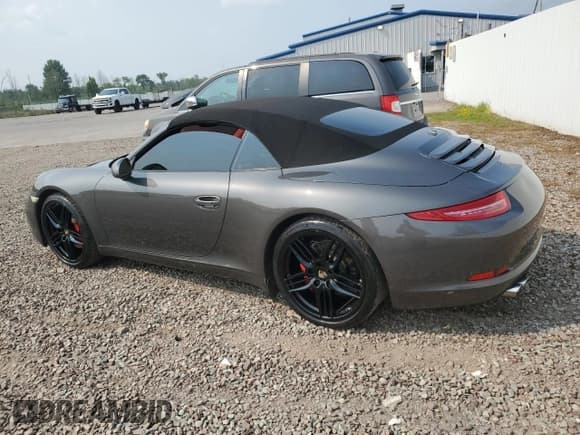 ✅ 2012 Porsche 911 Carrera S • VIN: WP0CB2A90CS154975 • Lot: 67983285. Listed on Copart with 74,710 mi. Free auction sales archive from the USA and detailed vehicle history report at DreamBid. Image 2.