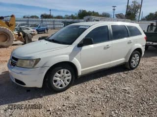 ✅ 2013 Dodge Journey American Value • VIN: 3C4PDCAB0DT715857 • Lot: 91132565. Listed on Copart with 155,761 mi. Free auction sales archive from the USA and detailed vehicle history report at DreamBid. Image 1.