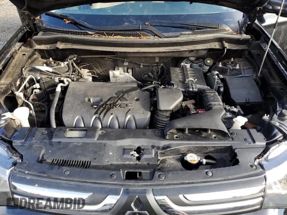 ✅ 2014 Mitsubishi Outlander SE • VIN: JA4AD3A33EZ016984 • Lot: 92532585. Listed on Copart with 170,371 mi. Free auction sales archive from the USA and detailed vehicle history report at DreamBid. Image 12.