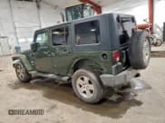 ✅ 2008 Jeep Wrangler Unlimited Sahara • VIN: 1J8GA59108L608334 • Lot: 94123835. Listed on Copart with 94,011 mi. Free auction sales archive from the USA and detailed vehicle history report at DreamBid. Image 2.