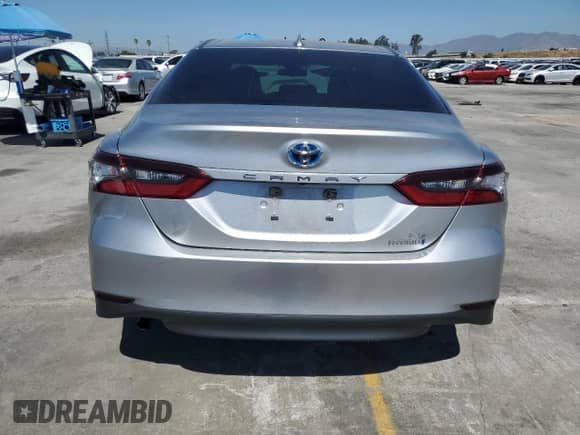2021 Toyota Camry Hybrid LE with VIN 4T1C31AK8MU549059, listed as a Copart auction lot 71496045 with 84,184 mi miles and Salvage title. Bid and sale history available at DreamBid. Image 6.