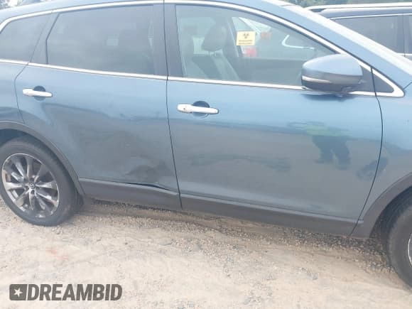 ✅ 2014 Mazda CX-9 Grand Touring • VIN: JM3TB2DAXE0440862 • Lot: 43216709. Wystawiony na IAAI z przebiegiem 209 316 mil. Bezpłatny archiwum sprzedaży aukcyjnych z USA i szczegółowy raport historii pojazdu na DreamBid. Zdjęcie 6.