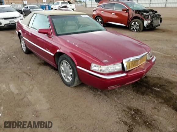 ✅ 2002 Cadillac Eldorado ESC • VIN: 1G6EL12Y22B101556 • Lot: 65088825. Listed on Copart with 107,057 mi. Free auction sales archive from the USA and detailed vehicle history report at DreamBid. Image 13.