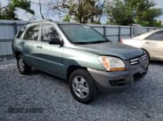 ✅ 2007 Kia Sportage LX • VIN: KNDJF724877415516 • Lot: 90549005. Wystawiony na Copart z przebiegiem 138 417 mil. Bezpłatny archiwum sprzedaży aukcyjnych z USA i szczegółowy raport historii pojazdu na DreamBid. Zdjęcie 4.