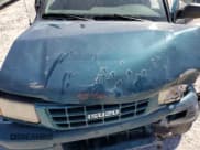 ✅ 1999 Isuzu Rodeo S • VIN: 4S2CM58W4X4330190 • Lot: 81996975. Wystawiony na Copart z przebiegiem 167 032 mil. Bezpłatny archiwum sprzedaży aukcyjnych z USA i szczegółowy raport historii pojazdu na DreamBid. Zdjęcie 12.