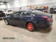 ✅ 2014 Jaguar XJ • VIN: SAJWA1CZ4E8V70391 • Лот: 52708345. Опубликован ранее на Copart с пробегом 100 229 миль. Бесплатный доступ к архиву аукционных продаж из США и подробный отчёт об истории автомобиля на DreamBid. Изображение 2.