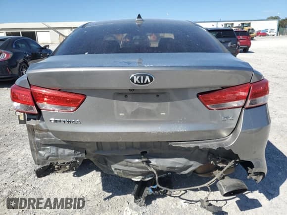 ✅ 2018 Kia Optima EX • VIN: 5XXGU4L33JG190389 • Лот: 89703945. Опубликован ранее на Copart с пробегом 123 158 миль. Бесплатный доступ к архиву аукционных продаж из США и подробный отчёт об истории автомобиля на DreamBid. Изображение 6.