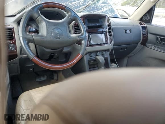 ✅ 2001 Mitsubishi Montero Limited • VIN: JA4MW51R01J036528 • Лот: 71670765. Опубликован ранее на Copart с пробегом 213 904 миль. Бесплатный доступ к архиву аукционных продаж из США и подробный отчёт об истории автомобиля на DreamBid. Изображение 8.