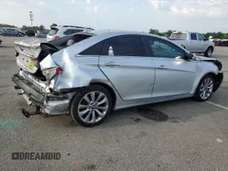 ✅ 2013 Hyundai Sonata SE • VIN: 5NPEC4AC9DH680793 • Lot: 68699014. Listed on Copart with 76,186 mi. Free auction sales archive from the USA and detailed vehicle history report at DreamBid. Image 3.