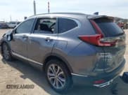 ✅ 2022 Honda CR-V Touring • VIN: 5J6RT6H98NL045367 • Lot: 43357038. Listed on IAAI with 59,282 mi. Free auction sales archive from the USA and detailed vehicle history report at DreamBid. Image 3.