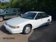 ✅ 1997 Oldsmobile Cutlass Supreme Series II • VIN: 1G3WH52M4VF327067 • Lot: 42709655. Wystawiony na IAAI z przebiegiem 176 945 mil. Bezpłatny archiwum sprzedaży aukcyjnych z USA i szczegółowy raport historii pojazdu na DreamBid. Zdjęcie 2.