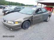 ✅ 2001 Pontiac Grand Prix SE • VIN: 1G2WK52J21F162657 • Лот: 42634127. Опубликован ранее на IAAI с пробегом 201 423 миль. Бесплатный доступ к архиву аукционных продаж из США и подробный отчёт об истории автомобиля на DreamBid. Изображение 2.