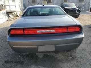 ✅ 2011 Dodge Challenger • VIN: 2B3CJ4DG9BH603294 • Lot: 90291775. Wystawiony na Copart z przebiegiem 149 681 mil. Bezpłatny archiwum sprzedaży aukcyjnych z USA i szczegółowy raport historii pojazdu na DreamBid. Zdjęcie 6.