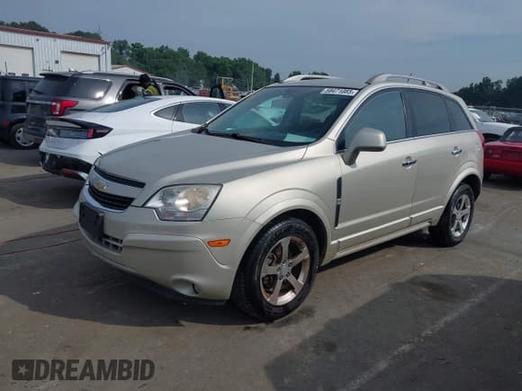 ✅ 2013 Chevrolet Captiva Sport LT • VIN: 3GNAL3EK2DS637422 • Lot: 42491071. Wystawiony na IAAI z przebiegiem 117 458 mil. Bezpłatny archiwum sprzedaży aukcyjnych z USA i szczegółowy raport historii pojazdu na DreamBid. Zdjęcie 2.