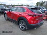 ✅ 2024 Mazda CX-30 S Carbon Edition • VIN: 3MVDMBCM6RM627083 • Lot: 41715241. Wystawiony na IAAI z przebiegiem 23 855 mil. Bezpłatny archiwum sprzedaży aukcyjnych z USA i szczegółowy raport historii pojazdu na DreamBid. Zdjęcie 3.