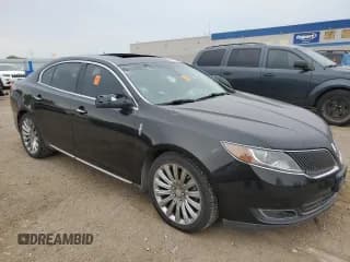 ✅ 2015 Lincoln MKS • VIN: 1LNHL9EK0FG608170 • Lot: 66771024. Listed on Copart with 99,040 mi. Free auction sales archive from the USA and detailed vehicle history report at DreamBid. Image 4.