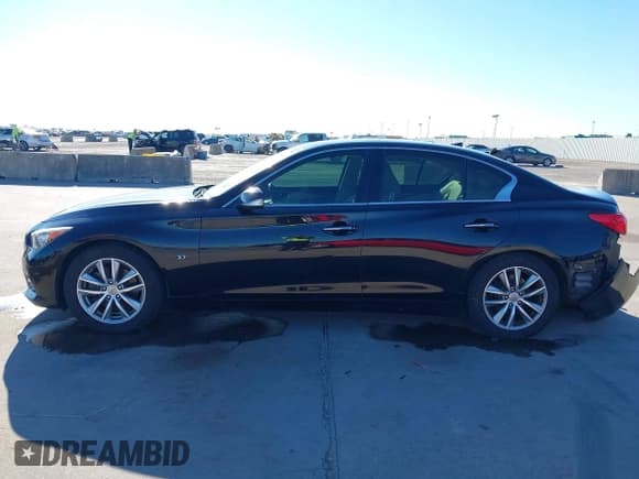 ✅ 2015 Infiniti Q50 Premium • VIN: JN1BV7AP0FM344284 • Лот: 43582071. Опубликован ранее на IAAI с пробегом 140 276 миль. Бесплатный доступ к архиву аукционных продаж из США и подробный отчёт об истории автомобиля на DreamBid. Изображение 14.